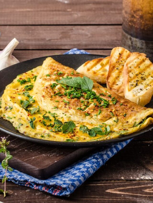 Herb omelette with chives and oregano sprinkled with chili flakes