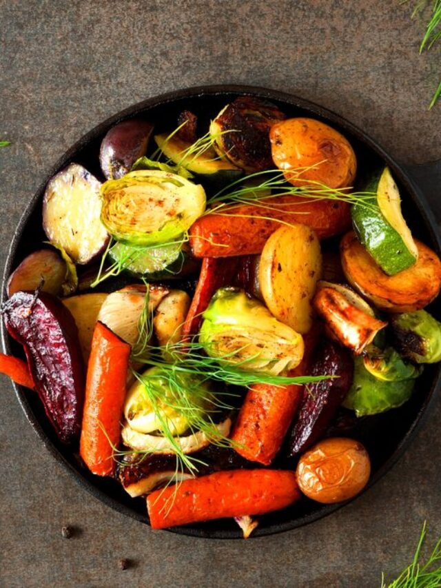 Cast iron skillet of roasted autumn vegetables