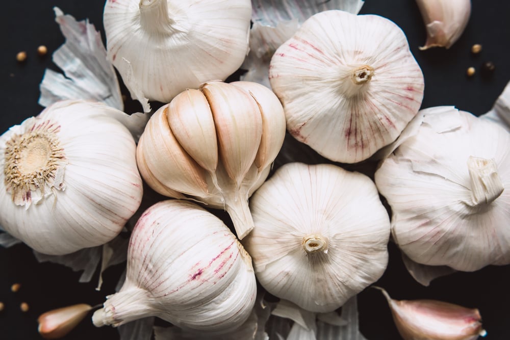 Why You Shouldn't Peel Your Garlic When You Use a Garlic Press